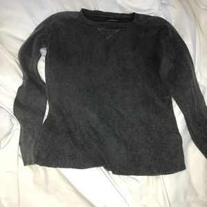 A gray sweater